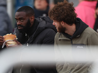 Hartlepool United's Manny Onariase and Anthony Mancini sit in the stands watching the FA Women's Championship match between Durham Women FC...