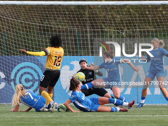 Charlene Meyong of London City Lionesses shoots at the goal, and Sarah Wilson allegedly stops it with her hand, resulting in a penalty kick...