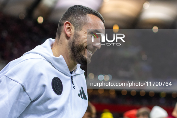 John McGinn walks onto the pitch during the UEFA Nations League 2024 A1 Group A match between Poland and Scotland at PGE Narodowe in Warsaw,...