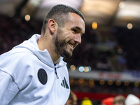 John McGinn walks onto the pitch during the UEFA Nations League 2024 A1 Group A match between Poland and Scotland at PGE Narodowe in Warsaw,...