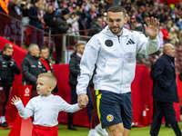 John McGinn walks onto the pitch during the UEFA Nations League 2024 A1 Group A match between Poland and Scotland at PGE Narodowe in Warsaw,...