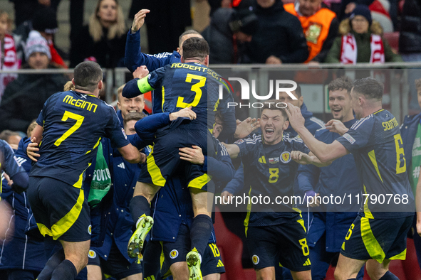 Scottish team celebrates scoring a winning goal  during the  UEFA Nations League 2024 League A Group A1 match between Poland and Scotland, a...