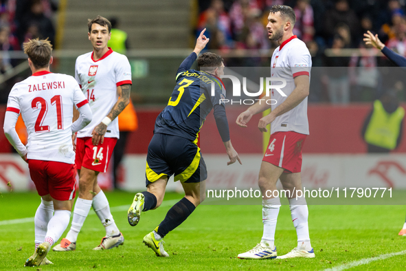 Andy Robertson (C)  celebrates scoring the winning goal during the  UEFA Nations League 2024 League A Group A1 match between Poland and Scot...