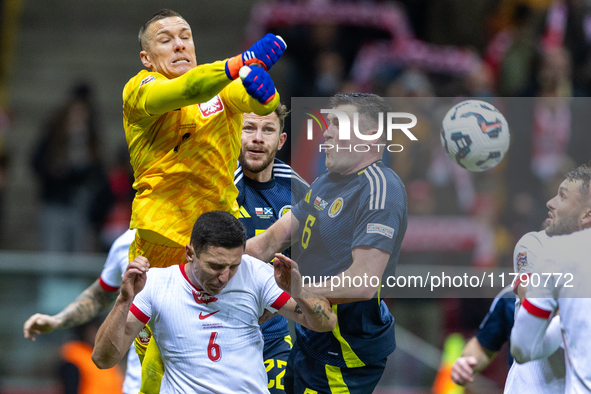 Lukasz Skorupski, Bartosz Slisz, Nicky Devlin and John Souttar in action during the  UEFA Nations League 2024 League A Group A1 match betwee...