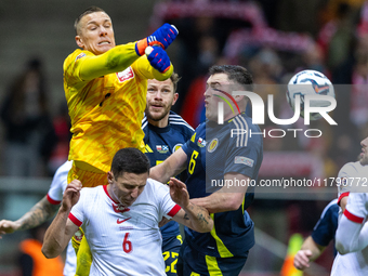 Lukasz Skorupski, Bartosz Slisz, Nicky Devlin and John Souttar in action during the  UEFA Nations League 2024 League A Group A1 match betwee...