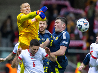 Lukasz Skorupski, Bartosz Slisz, Nicky Devlin and John Souttar in action during the  UEFA Nations League 2024 League A Group A1 match betwee...