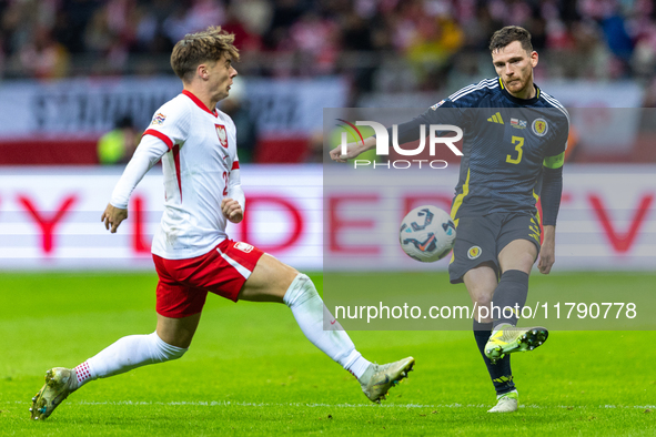 Nicola Zalewski and Andy Robertson during the  UEFA Nations League 2024 League A Group A1 match between Poland and Scotland, at the  PGE Nar...