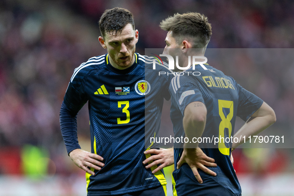 Andy Robertson and Billy Gilmour  talk during the  UEFA Nations League 2024 League A Group A1 match between Poland and Scotland, at the  PGE...