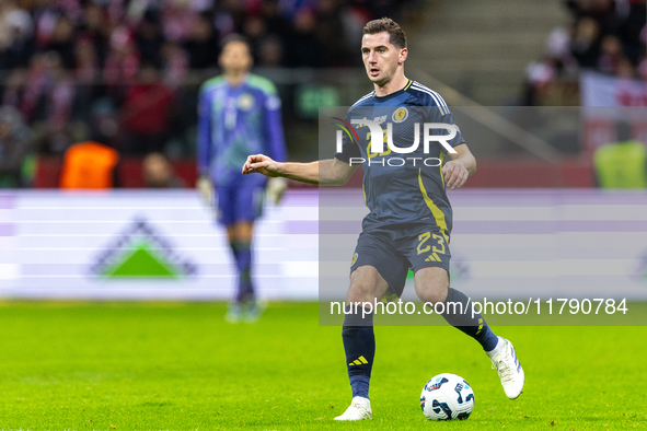 Kenny McLean  in action during the  UEFA Nations League 2024 League A Group A1 match between Poland and Scotland, at the  PGE Narodowy in Wa...