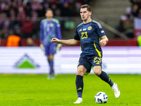 Kenny McLean  in action during the  UEFA Nations League 2024 League A Group A1 match between Poland and Scotland, at the  PGE Narodowy in Wa...