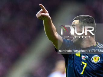 John McGinn reacts during the  UEFA Nations League 2024 League A Group A1 match between Poland and Scotland, at the  PGE Narodowy in Warsaw,...