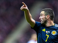 John McGinn reacts during the  UEFA Nations League 2024 League A Group A1 match between Poland and Scotland, at the  PGE Narodowy in Warsaw,...