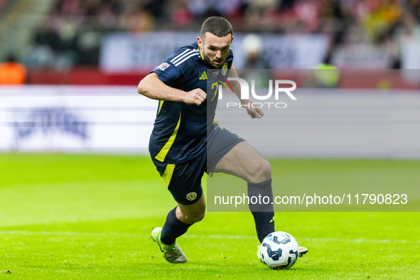 John McGinn in action during the  UEFA Nations League 2024 League A Group A1 match between Poland and Scotland, at the  PGE Narodowy in Wars...