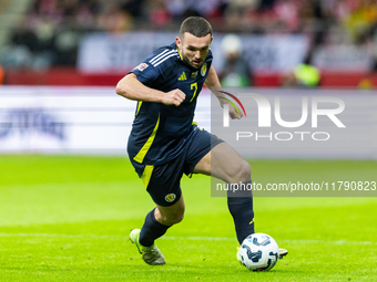 John McGinn in action during the  UEFA Nations League 2024 League A Group A1 match between Poland and Scotland, at the  PGE Narodowy in Wars...