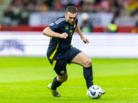 John McGinn in action during the  UEFA Nations League 2024 League A Group A1 match between Poland and Scotland, at the  PGE Narodowy in Wars...