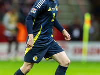 Andy Robertson in action during the  UEFA Nations League 2024 League A Group A1 match between Poland and Scotland, at the  PGE Narodowy in W...