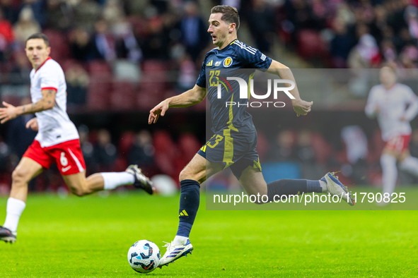 Kenny McLean in action during the  UEFA Nations League 2024 League A Group A1 match between Poland and Scotland, at the  PGE Narodowy in War...