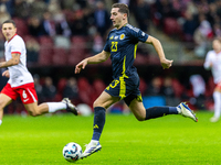 Kenny McLean in action during the  UEFA Nations League 2024 League A Group A1 match between Poland and Scotland, at the  PGE Narodowy in War...