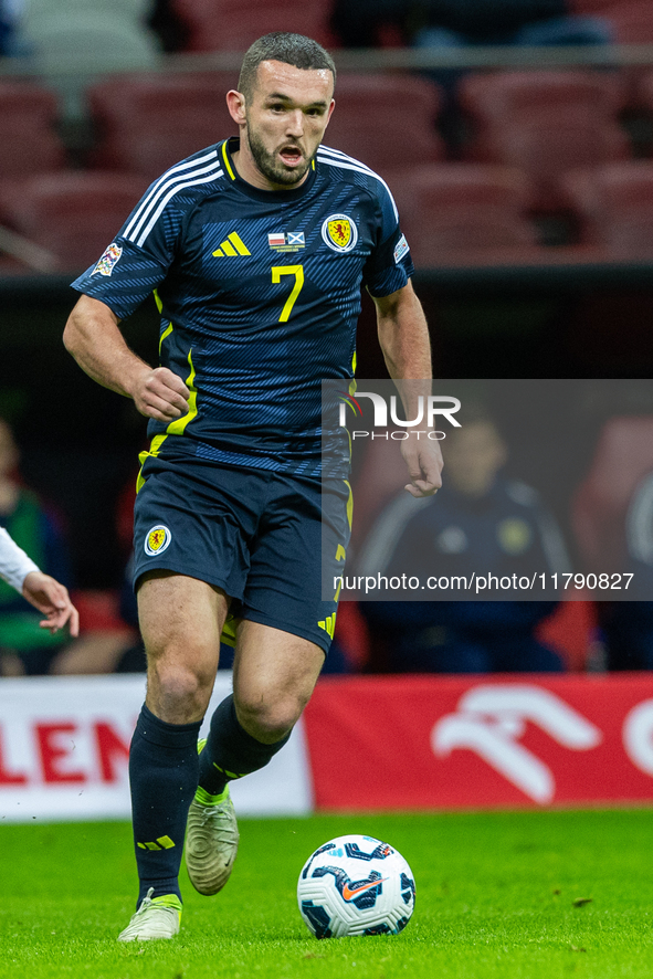 John McGinn in action during the  UEFA Nations League 2024 League A Group A1 match between Poland and Scotland, at the  PGE Narodowy in Wars...