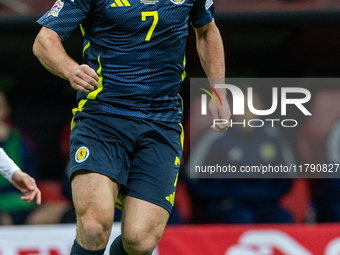 John McGinn in action during the  UEFA Nations League 2024 League A Group A1 match between Poland and Scotland, at the  PGE Narodowy in Wars...