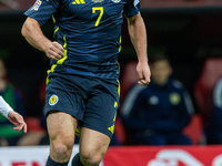 John McGinn in action during the  UEFA Nations League 2024 League A Group A1 match between Poland and Scotland, at the  PGE Narodowy in Wars...