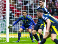 Craig Gordon in action during the  UEFA Nations League 2024 League A Group A1 match between Poland and Scotland, at the  PGE Narodowy in War...