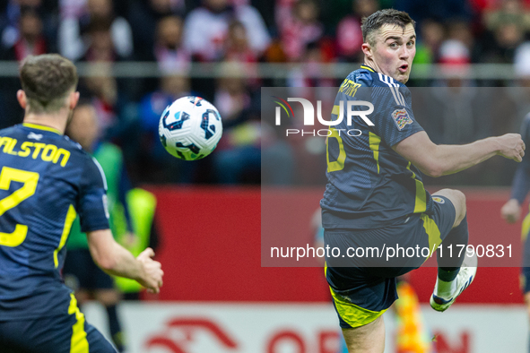 John Souttar in action during the  UEFA Nations League 2024 League A Group A1 match between Poland and Scotland, at the  PGE Narodowy in War...