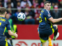 John Souttar in action during the  UEFA Nations League 2024 League A Group A1 match between Poland and Scotland, at the  PGE Narodowy in War...