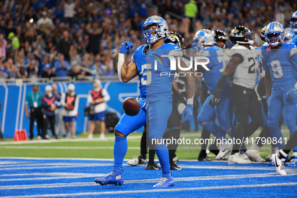 DETROIT,MICHIGAN-November 17: Detroit Lions running back David Montgomery (5) reacts after scoring a touchdown during the first half of an N...