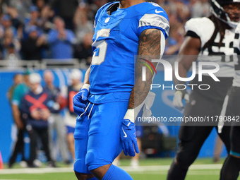 DETROIT,MICHIGAN-November 17: Detroit Lions running back David Montgomery (5) reacts after scoring a touchdown during the first half of an N...