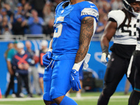 DETROIT,MICHIGAN-November 17: Detroit Lions running back David Montgomery (5) reacts after scoring a touchdown during the first half of an N...