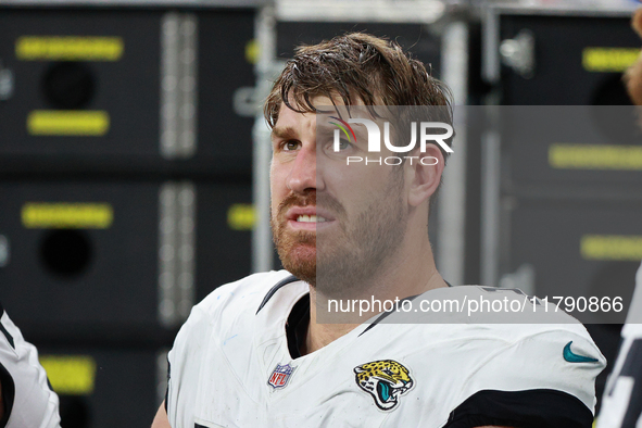 DETROIT,MICHIGAN-November 17: Jacksonville Jaguars offensive tackle Walker Little (72) is seen on the sideline during the first half of an N...