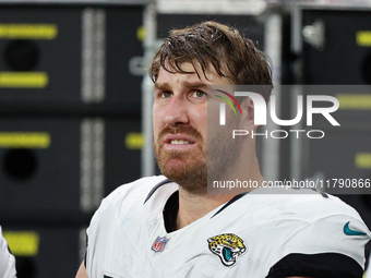 DETROIT,MICHIGAN-November 17: Jacksonville Jaguars offensive tackle Walker Little (72) is seen on the sideline during the first half of an N...