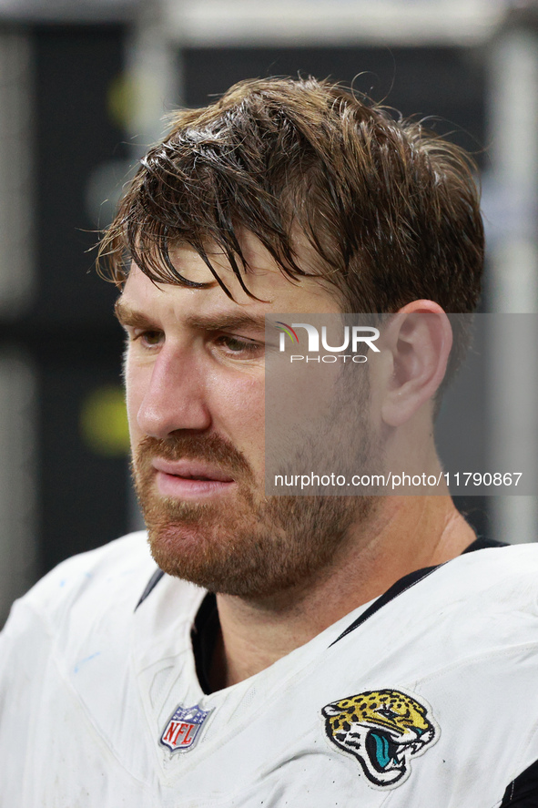 DETROIT,MICHIGAN-November 17: Jacksonville Jaguars offensive tackle Walker Little (72) is seen on the sideline during the first half of an N...