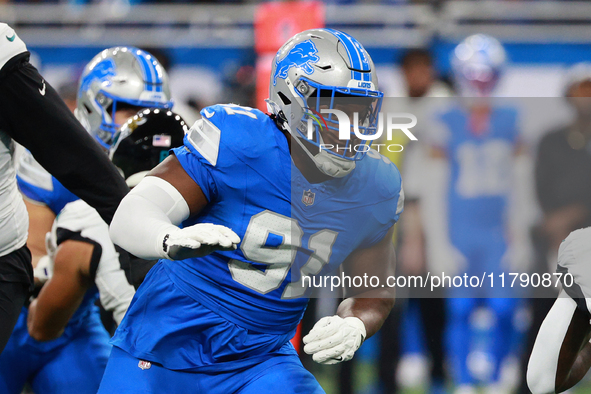 DETROIT,MICHIGAN-November 17: Detroit Lions defensive end Levi Onwuzurike (91) is seen during the first half of an NFL football game between...