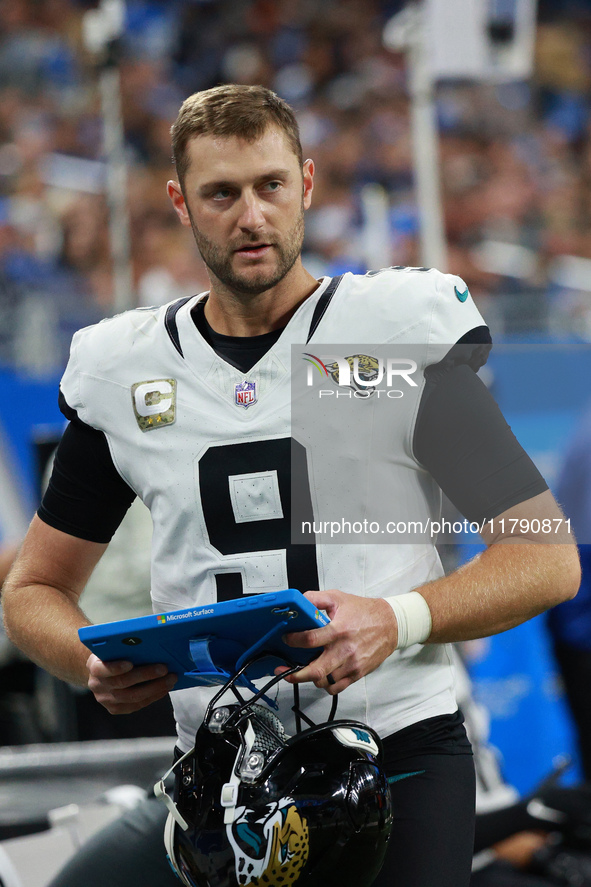 DETROIT,MICHIGAN-November 17: Jacksonville Jaguars punter Logan Cooke (9) looks on during the first half of an NFL football game between the...