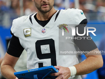 DETROIT,MICHIGAN-November 17: Jacksonville Jaguars punter Logan Cooke (9) looks on during the first half of an NFL football game between the...