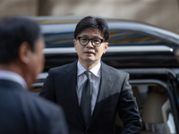 Han Dong-hoon, leader of the People Power Party, arrives at the Korean Federation of Trade Unions headquarters in Yeouido for a meeting with...