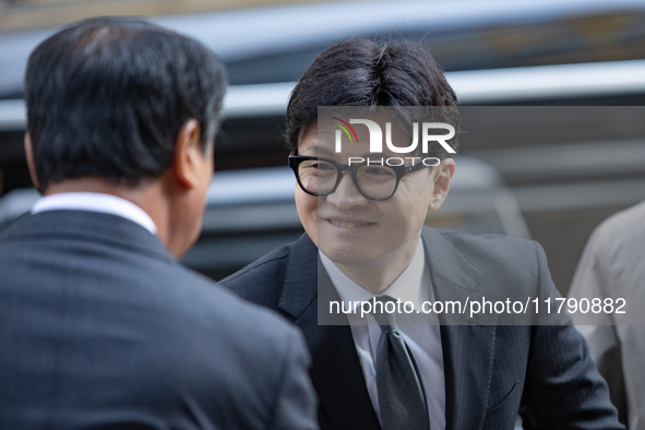 Han Dong-hoon, leader of the People Power Party, arrives at the Korean Federation of Trade Unions headquarters in Yeouido for a meeting with...