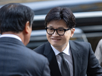 Han Dong-hoon, leader of the People Power Party, arrives at the Korean Federation of Trade Unions headquarters in Yeouido for a meeting with...