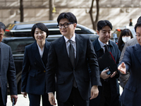 Han Dong-hoon, leader of the People Power Party, arrives at the Korean Federation of Trade Unions headquarters in Yeouido for a meeting with...