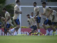 In Ezeiza, Buenos Aires, on November 18, 2024, Lionel Messi, a player of the Argentina National Team, jogs alongside his teammates during a...