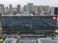 The East China headquarters building of Xiaomi Group is seen in Nanjing, China, on November 19, 2024. Xiaomi Group announces that its revenu...