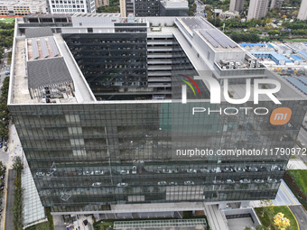 The East China headquarters building of Xiaomi Group is seen in Nanjing, China, on November 19, 2024. Xiaomi Group announces that its revenu...