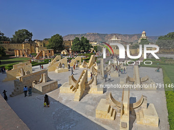 Tourists visit the historical Jantar Mantar on the occasion of the 297th Foundation of 'Pink City' in Jaipur, Rajasthan, India, on November...