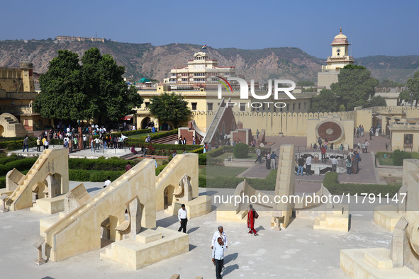 Tourists visit the historical Jantar Mantar on the occasion of the 297th Foundation of 'Pink City' in Jaipur, Rajasthan, India, on November...