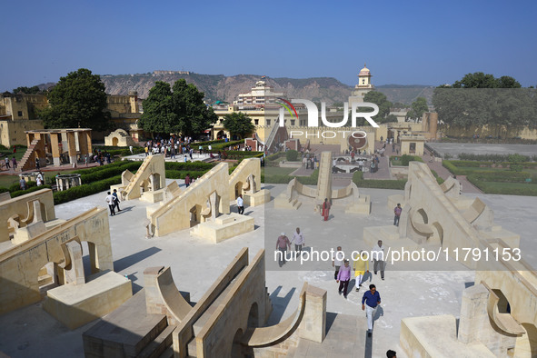 Tourists visit the historical Jantar Mantar on the occasion of the 297th Foundation of 'Pink City' in Jaipur, Rajasthan, India, on November...