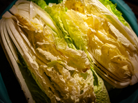 A view of napa cabbage cut in two, ready to make the fermented South Korean food, Kimchi, on November 10, 2024. (