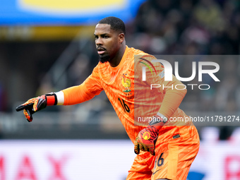 Mike Maignan of France gestures during the UEFA Nations League 2024/25 League A Group 2 match between Italy and France at Stadio Giuseppe Me...