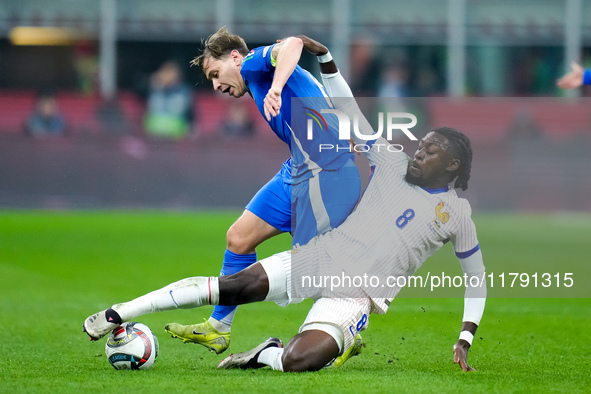 Nicolo' Barella of Italy and Manu Kone' of France compete for the ball during the UEFA Nations League 2024/25 League A Group 2 match between...